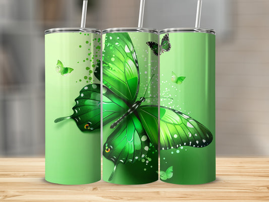 Green butterfly tumbler with swirling green accents and smaller butterflies.