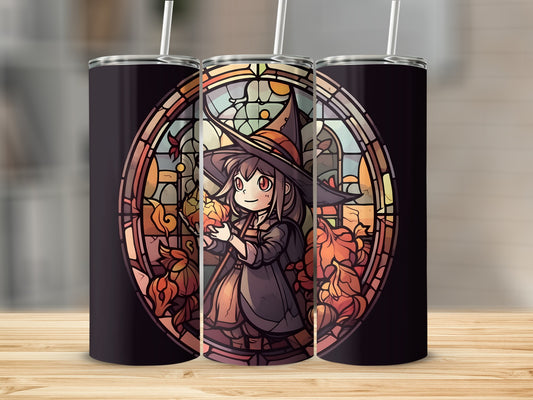 Stained glass tumbler with anime witch holding pumpkin and autumn leaves.