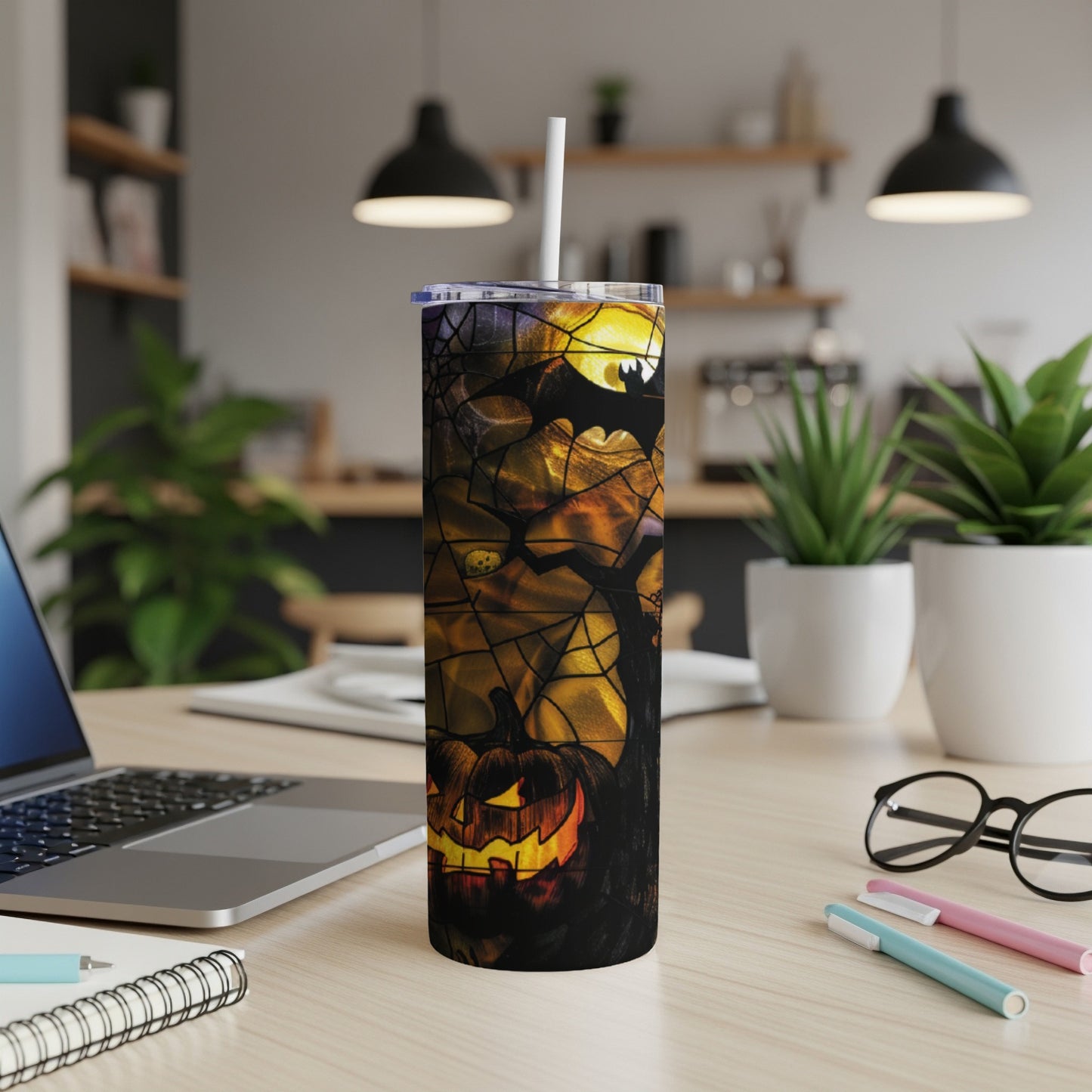 Spooky Halloween tumbler with jack-o'-lantern and cobweb design.