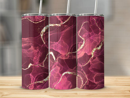 Three burgundy tumblers with abstract pink and gold marbling designs.