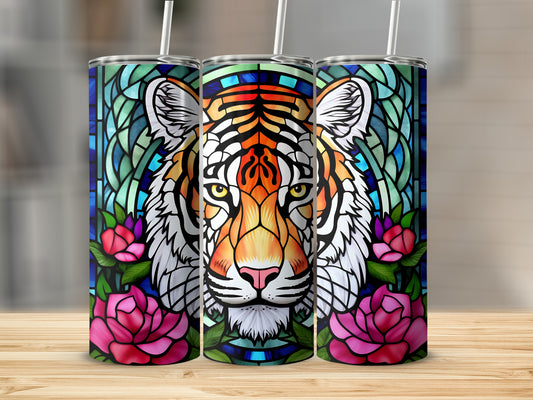 Stained glass tiger face with pink roses on a tumbler.