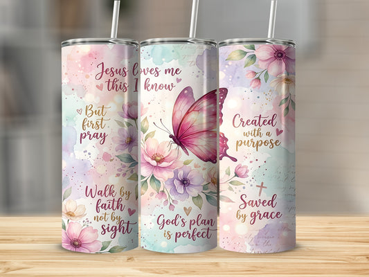 Watercolor tumbler with butterfly, flowers, and inspirational text.