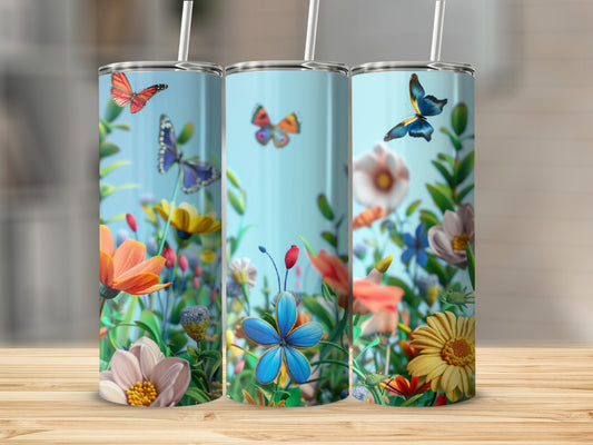 Three tall, insulated tumblers with a vibrant floral and butterfly design.