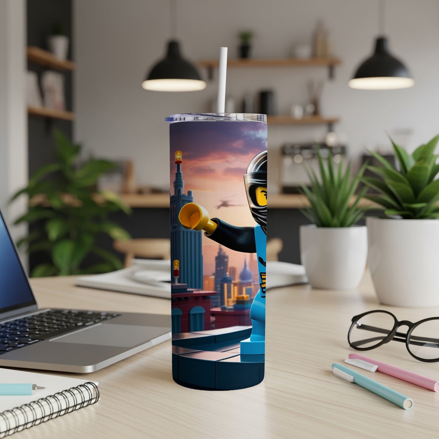 Lego minifigure holding telescope on cityscape tumbler.