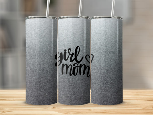 Gray ombre tumbler with "girl mom" text, displayed on a wooden surface.
