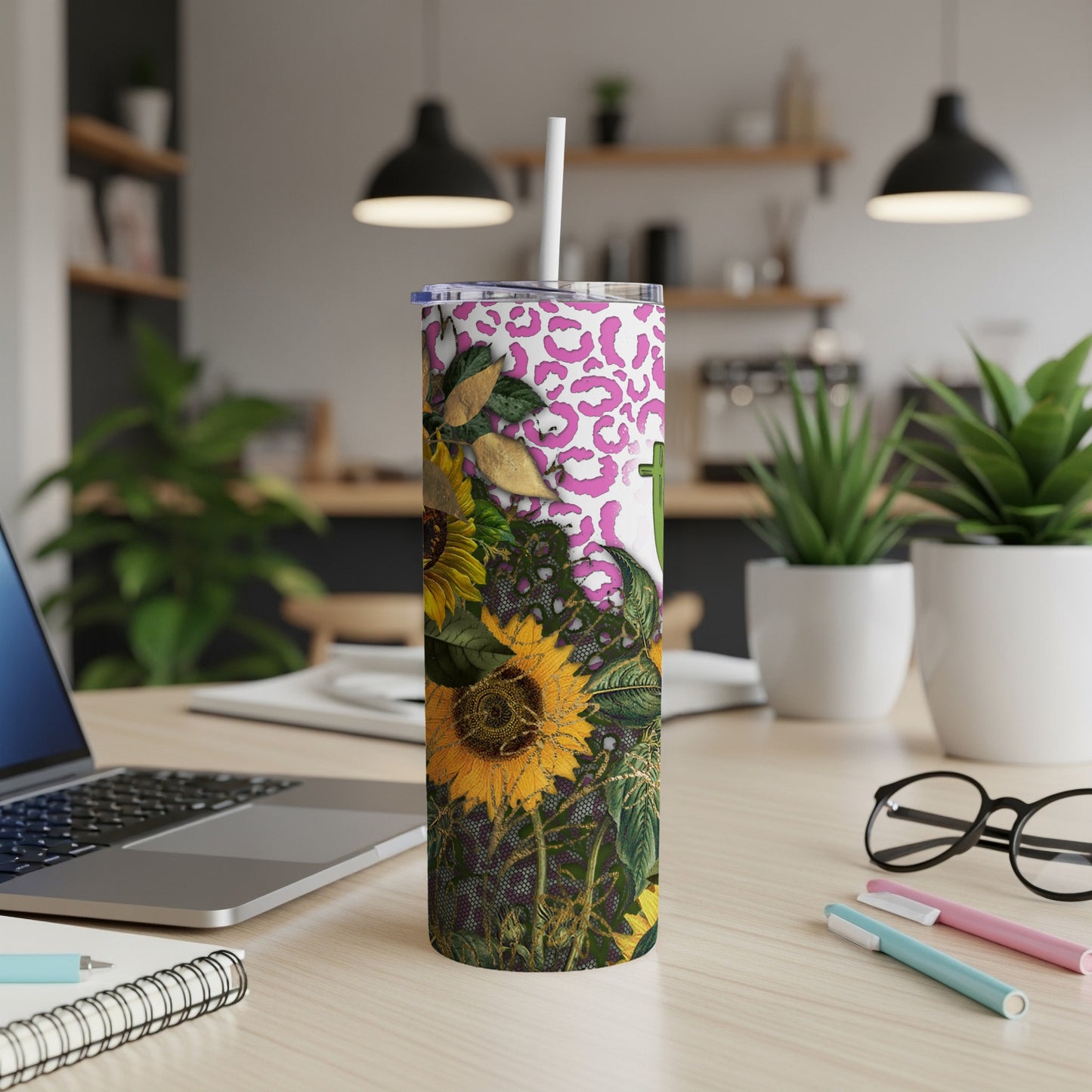 White tumbler with leopard print and sunflower design.