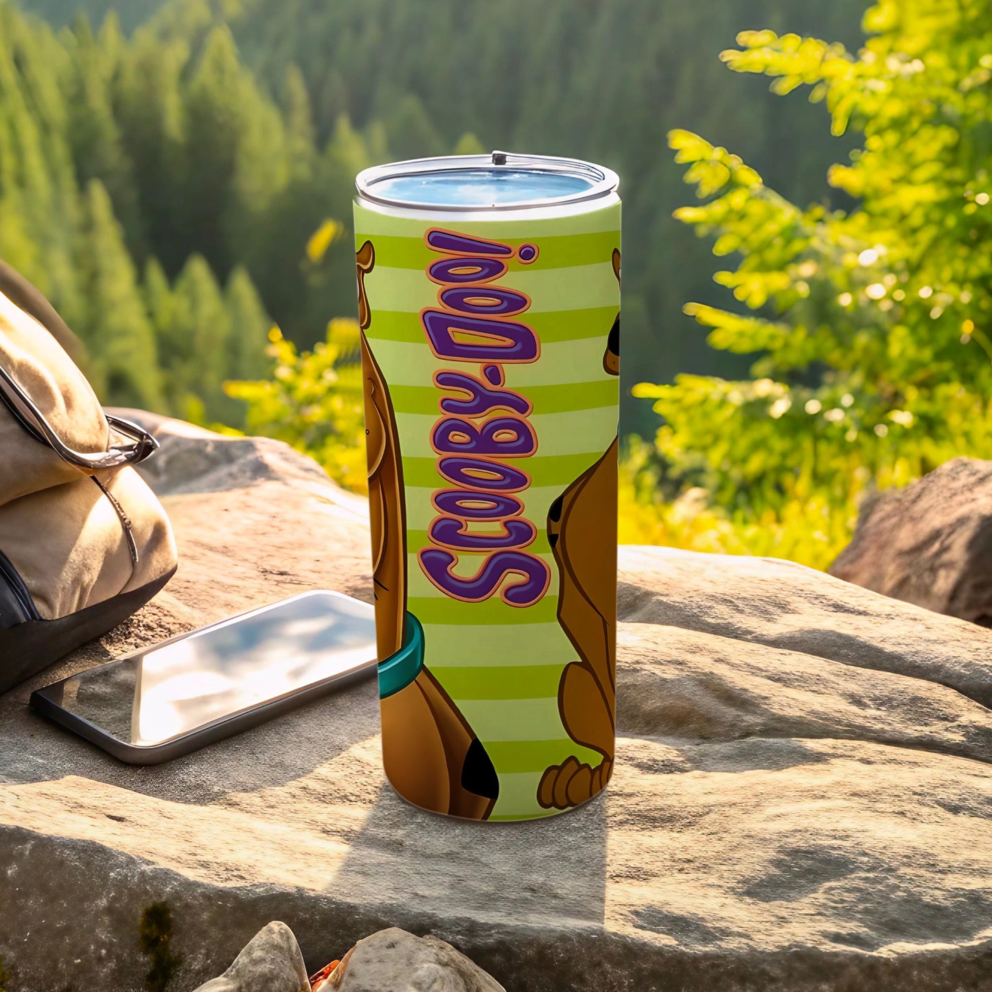 Scooby-Doo tumbler with green stripes and Scooby in a playful pose.