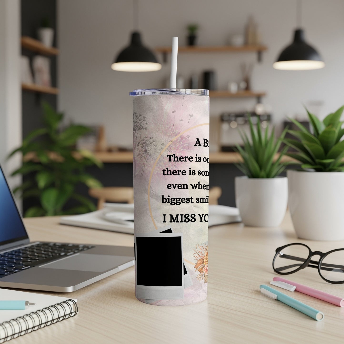 Tumbler with floral pattern and text "I MISS YOU" and "A big smile".