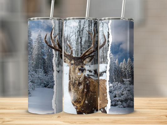 Three tumblers featuring snowy forest scenes and a stag's portrait.