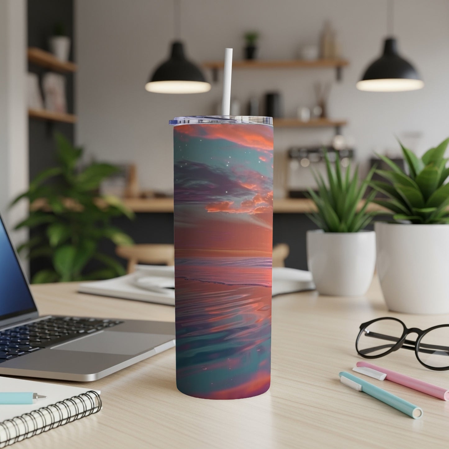 Tall tumbler with colorful sunset reflection on water.