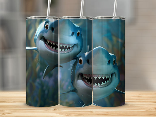 Three tumblers featuring smiling cartoon sharks with straw lids.