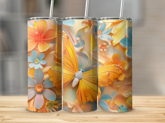 Orange and yellow butterfly on a pastel floral tumbler with straw.