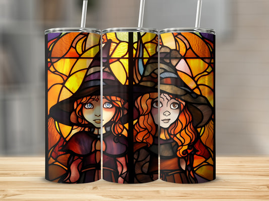 Three stained-glass tumblers featuring witches against a colorful, geometric background.