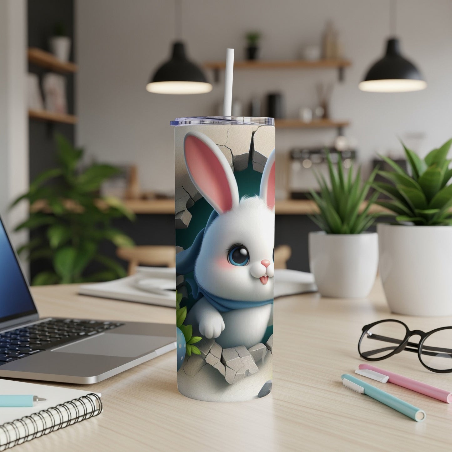 White bunny with blue scarf bursting through cracked wall on tumbler.