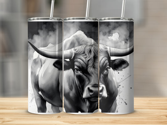 Black and white watercolor bull with large horns on a tumbler.