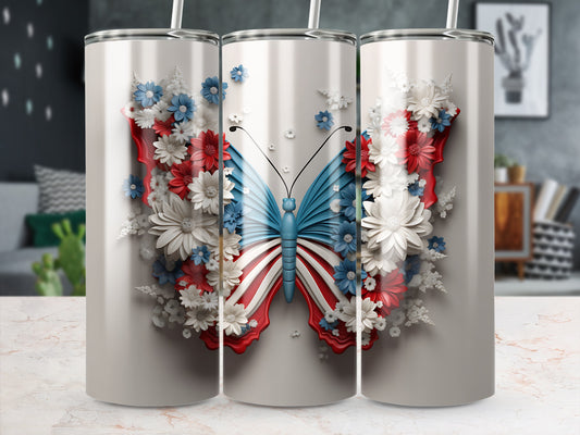 Patriotic butterfly design on three white tumblers with straws.