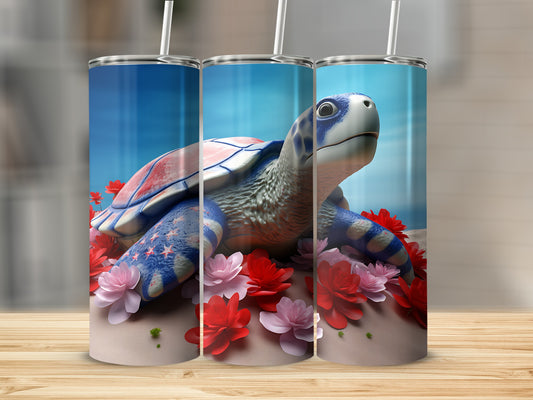 Patriotic turtle tumbler with flowers, on a wooden surface.