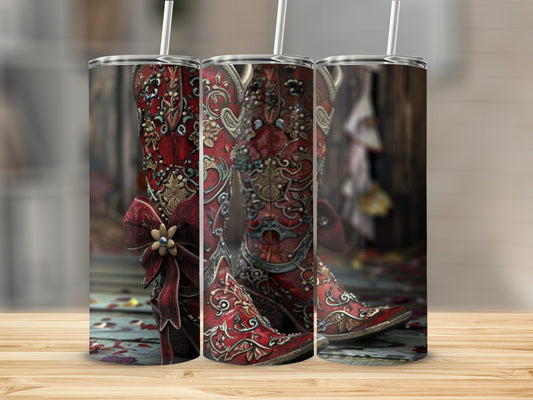 Red cowboy boots with ornate gold stitching and a red bow detail.