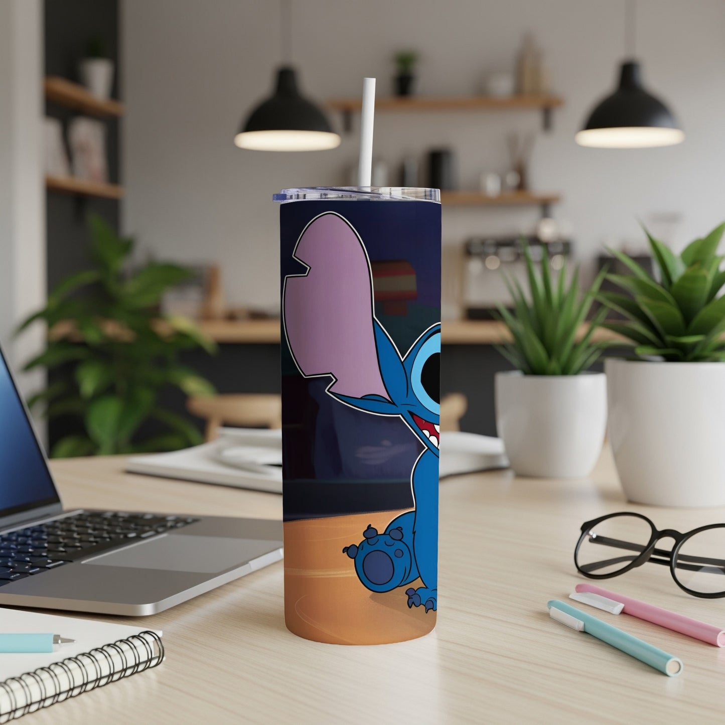 Blue Stitch character on a tumbler with a white straw.