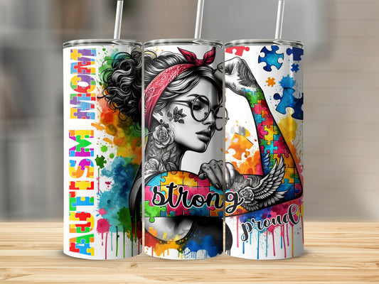 Autism Mom strong tumbler with colorful puzzle pieces and paint splatter.