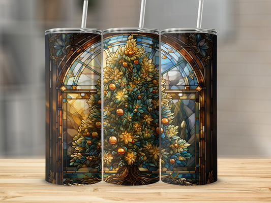 Three tumblers with stained glass Christmas tree design displayed on a wooden surface.