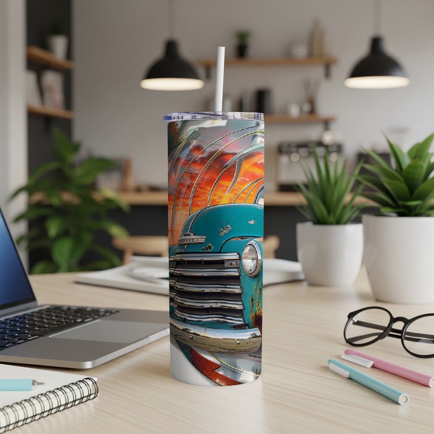 Turquoise vintage truck with sunset background on a skinny tumbler.