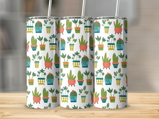 Three tumblers with a white base and a colorful pattern of potted plants and cacti.
