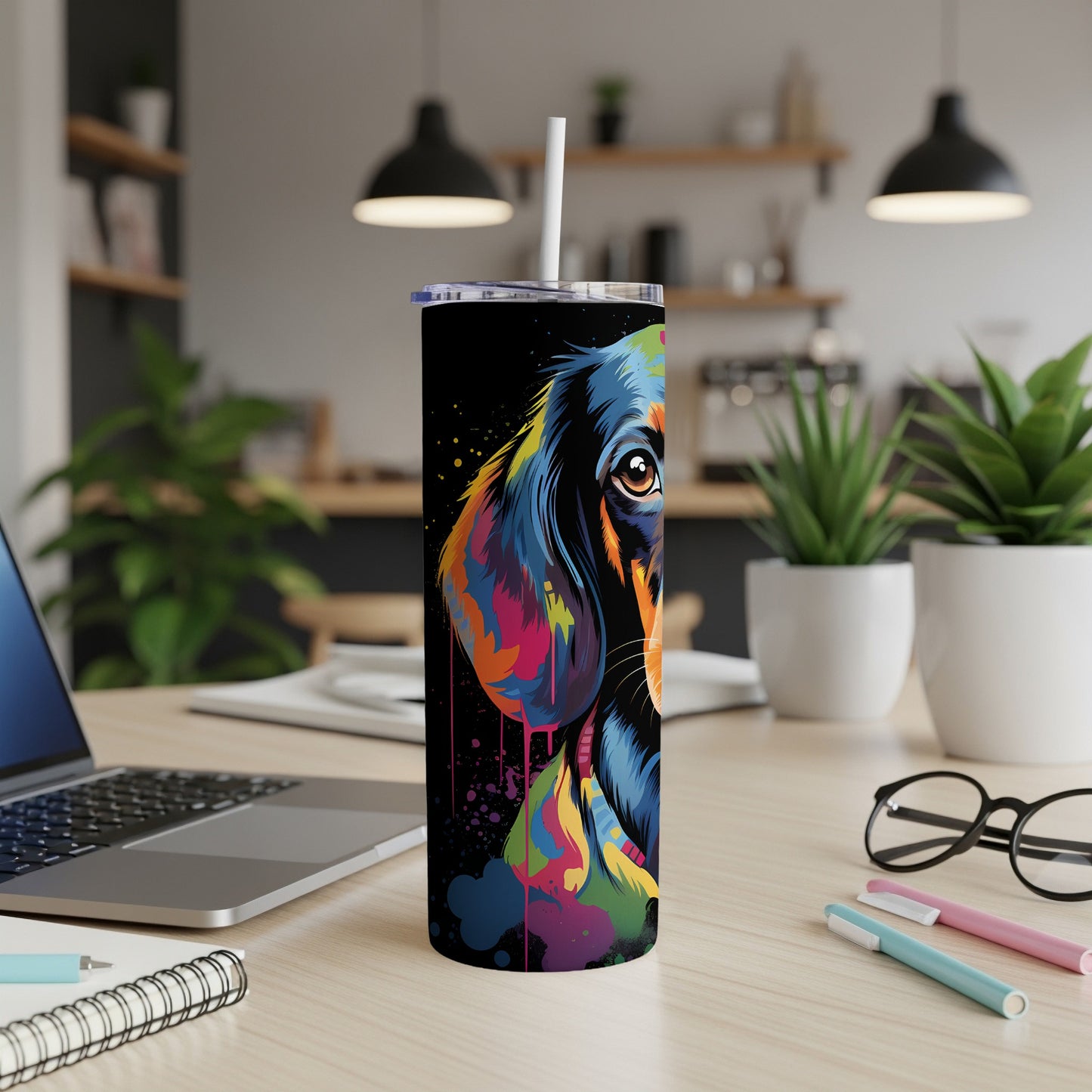 Colorful dachshund art on a black insulated tumbler with straw.