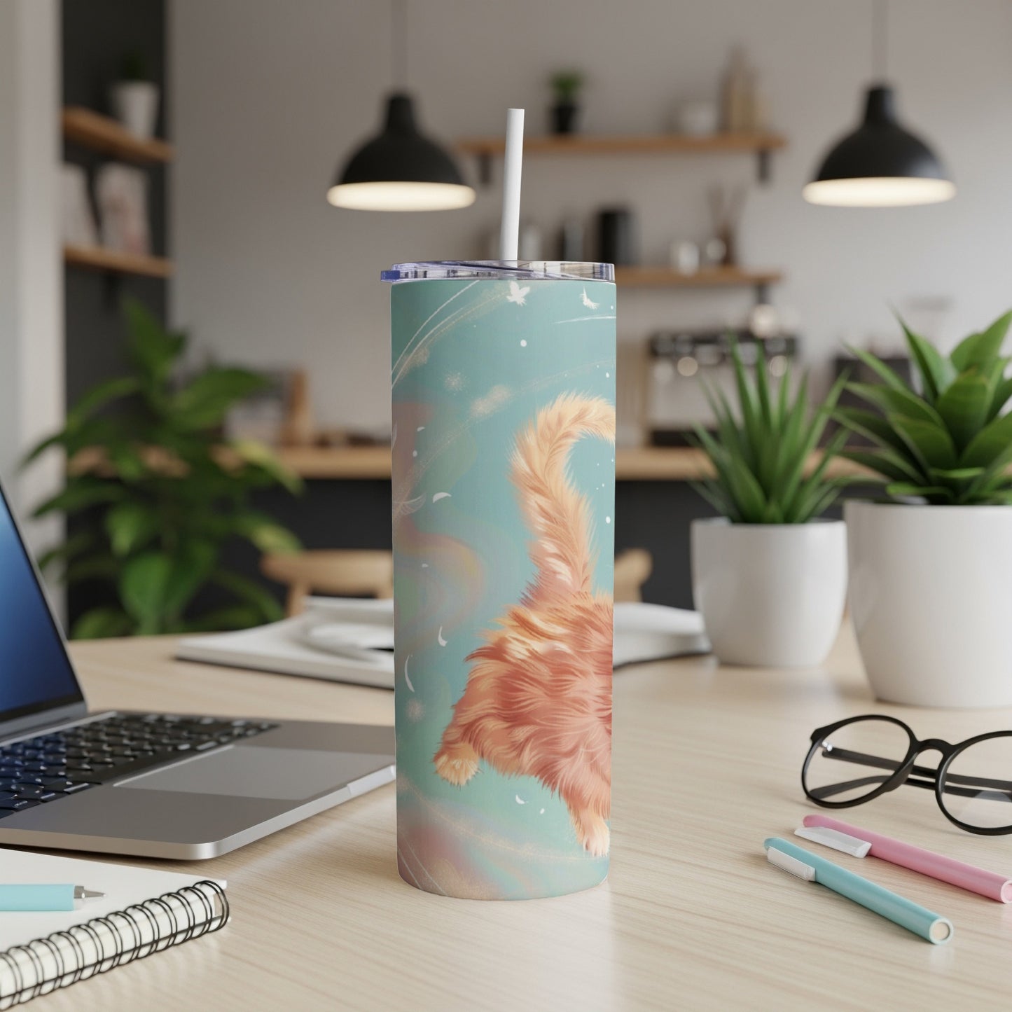 Orange tabby cat tail pattern on a teal tumbler with a straw.