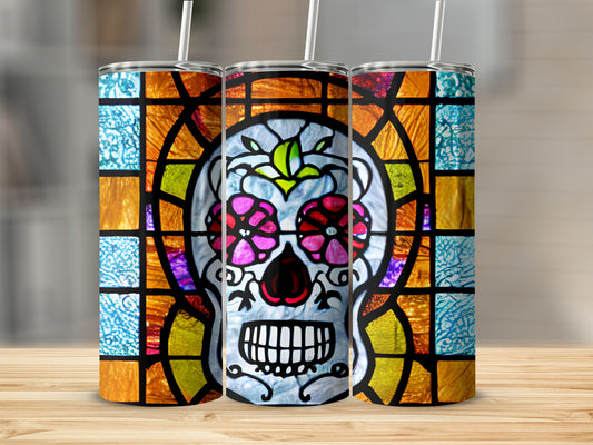Stained glass sugar skull tumbler with colorful floral eyes.