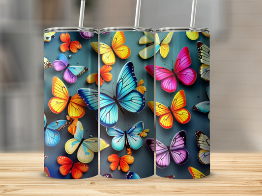 Three tumblers featuring colorful butterflies on a teal background.