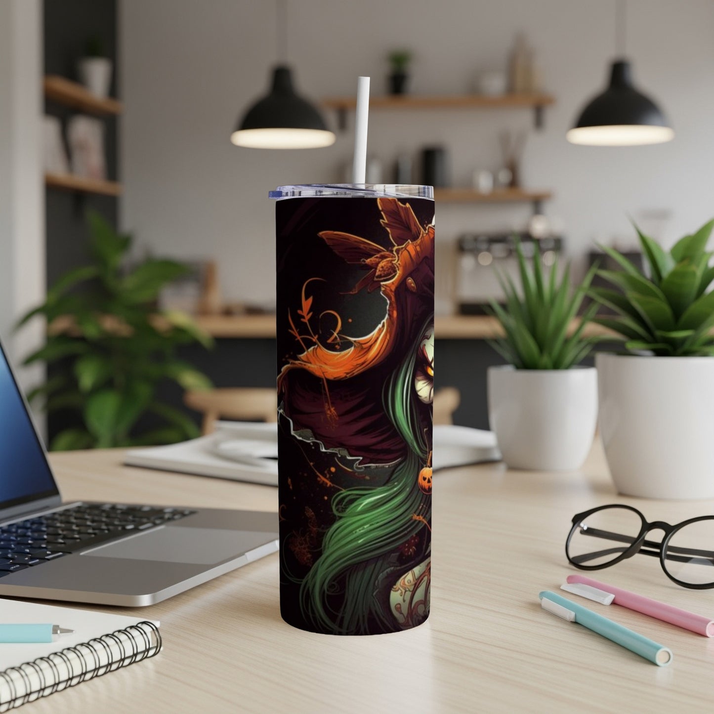 Tumbler featuring spooky witch with green hair and pumpkin accent.