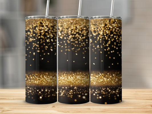 Three tumblers with gold glitter falling on a black background.