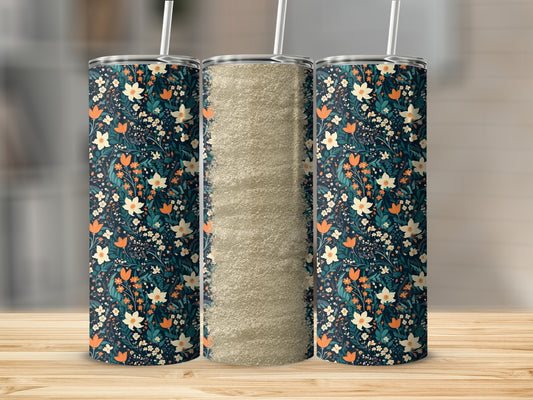 Three floral tumblers with straws, one with a glitter texture.