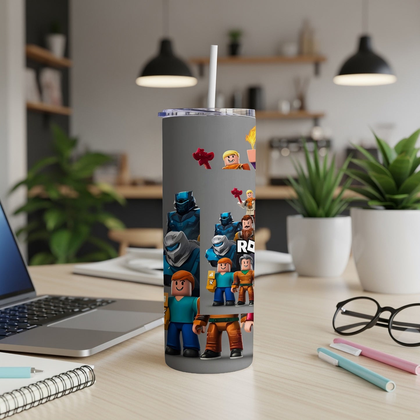 Roblox characters on a gray tumbler with a straw.