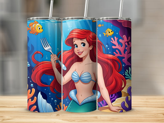 Ariel the mermaid holding a fork, with fish and coral.