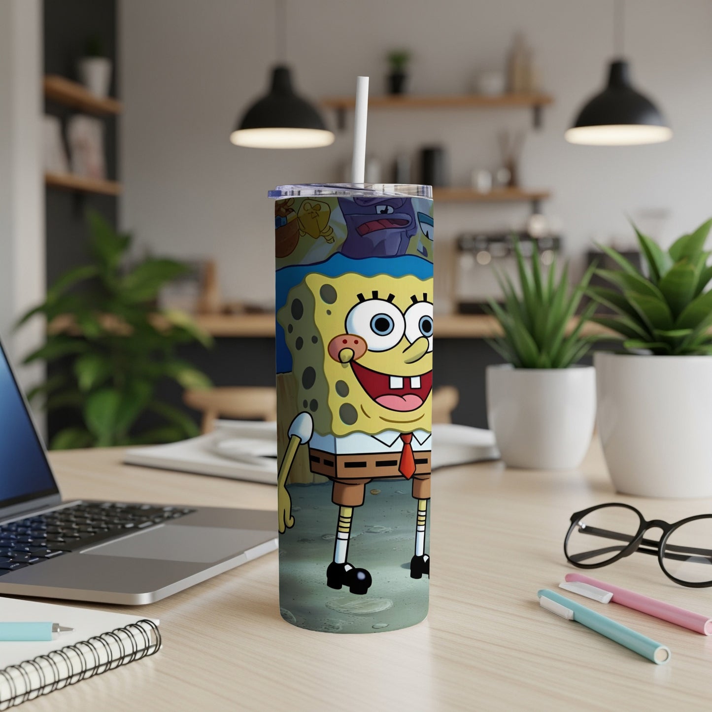SpongeBob SquarePants character on a tumbler with a straw.