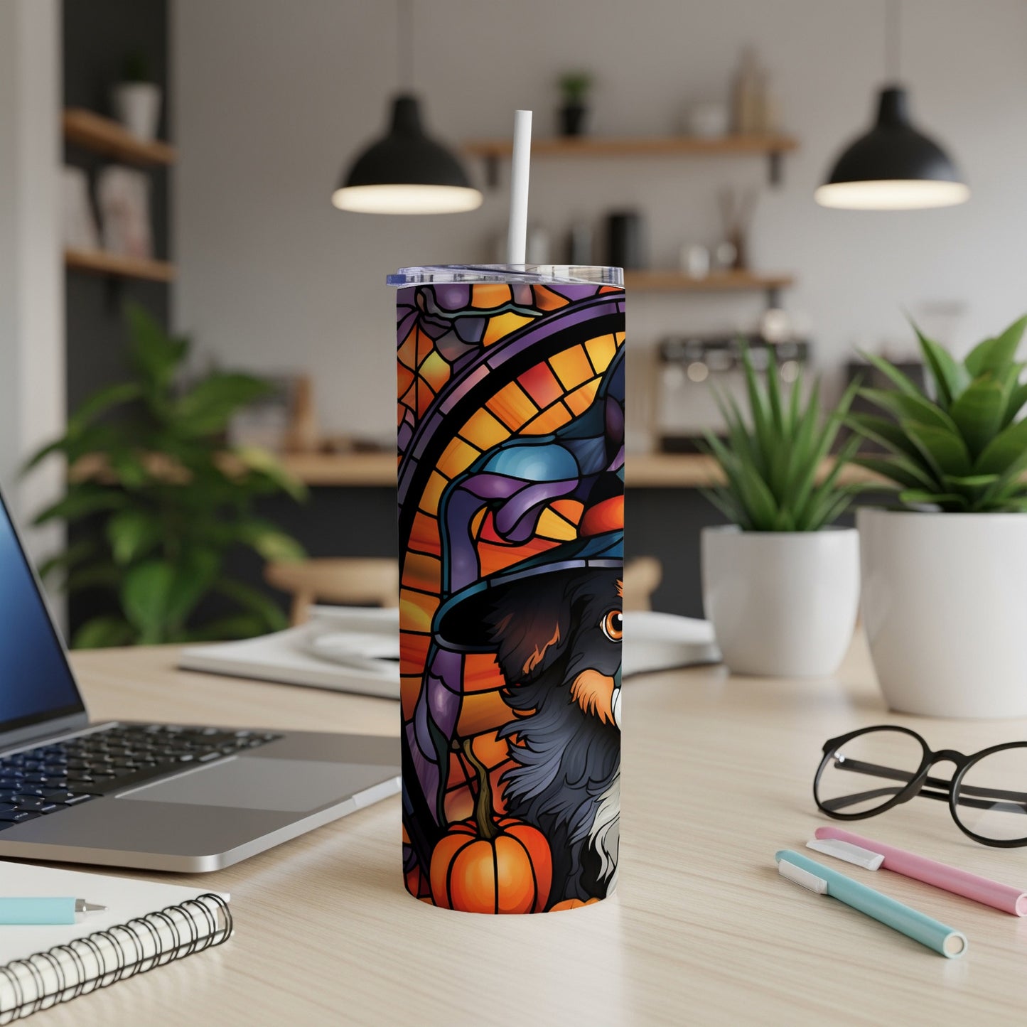 Halloween tumbler with a witch hat-wearing dog and pumpkin design.