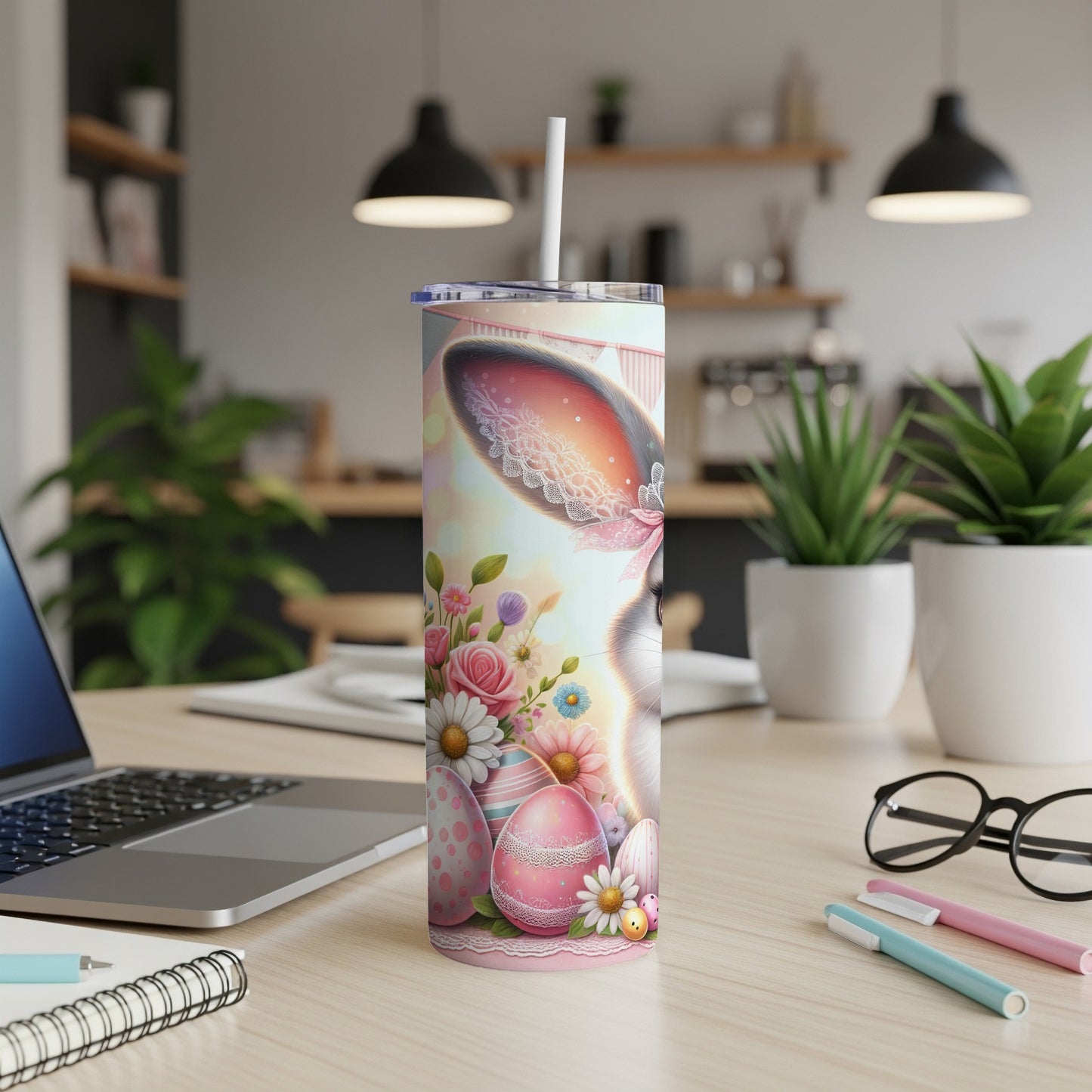 Easter bunny with flowers and eggs on a pink floral patterned tumbler.