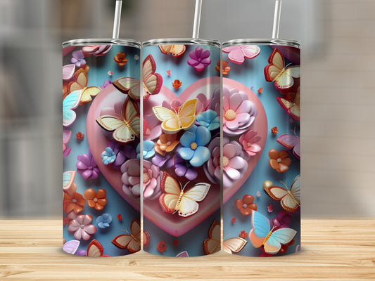 Three tumblers with colorful butterflies and flowers on a heart background.