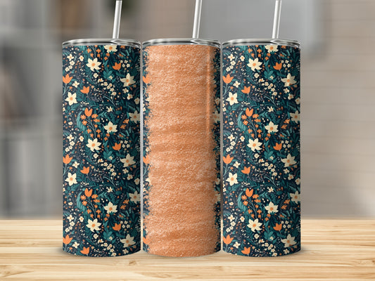 Dark blue tumbler with orange and white floral pattern, and a second tumbler with textured orange.