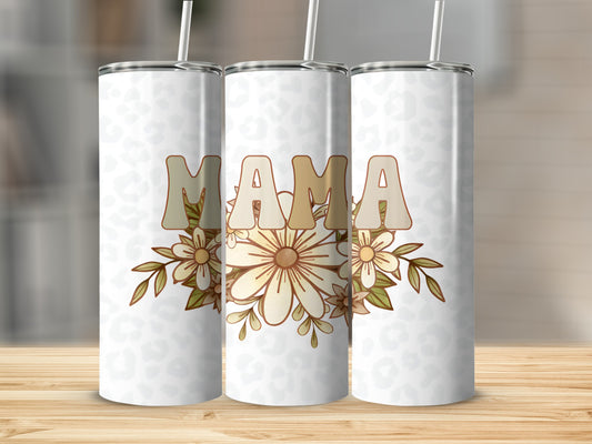 White tumbler with "Mama" in tan letters surrounded by flowers.