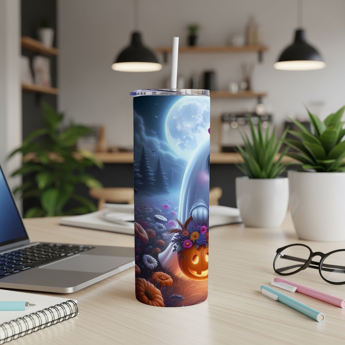Tumbler with ghost holding pumpkin basket, moonlit night, and floral pattern.
