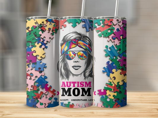 Woman with sunglasses and puzzle pieces design, text "Autism Mom Accept. Understand. Love."