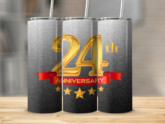 "24th Anniversary" text on a tumbler with gold stars and red ribbon.