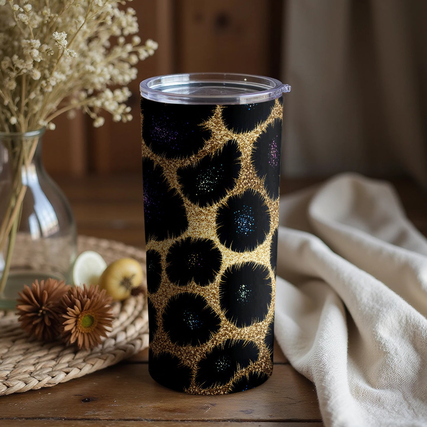 Stylish Black and Gold Tumbler with Artistic Design