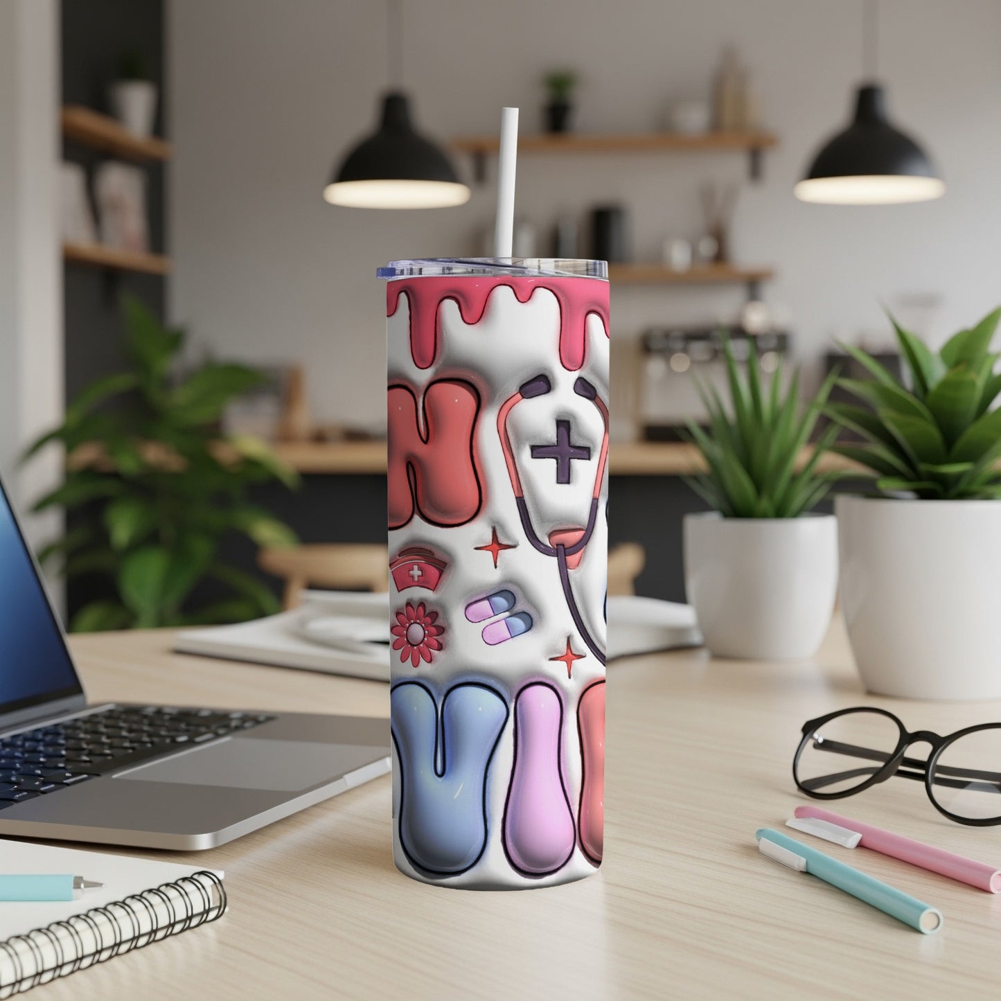 Pink and blue "RN" text with medical symbols on a stainless steel tumbler.