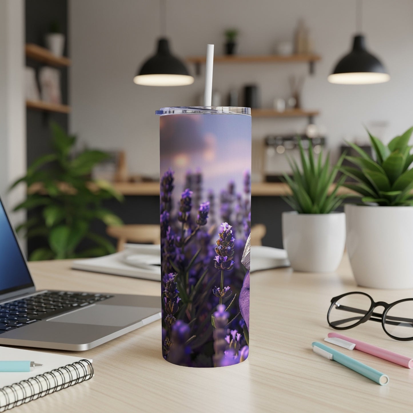 Purple butterfly on lavender flowers on a tumbler with straw.