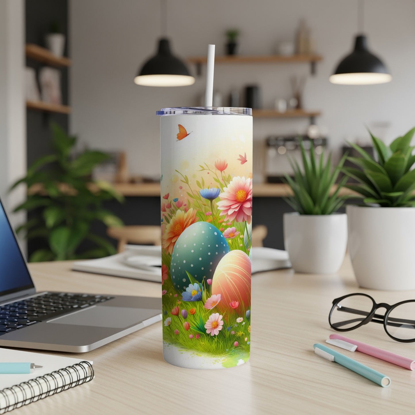 Easter egg pattern on a white tumbler with flowers and butterflies.
