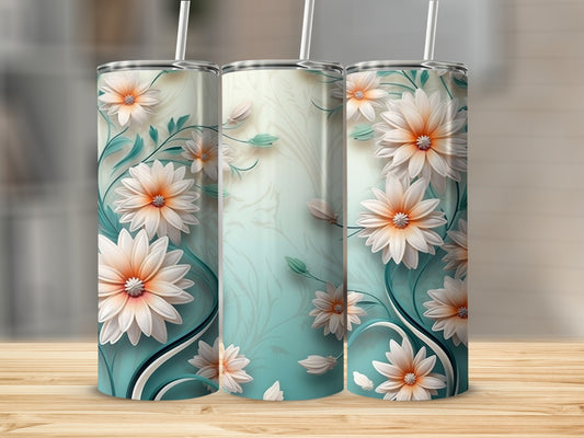 Three tumblers with a floral design of white and orange flowers.